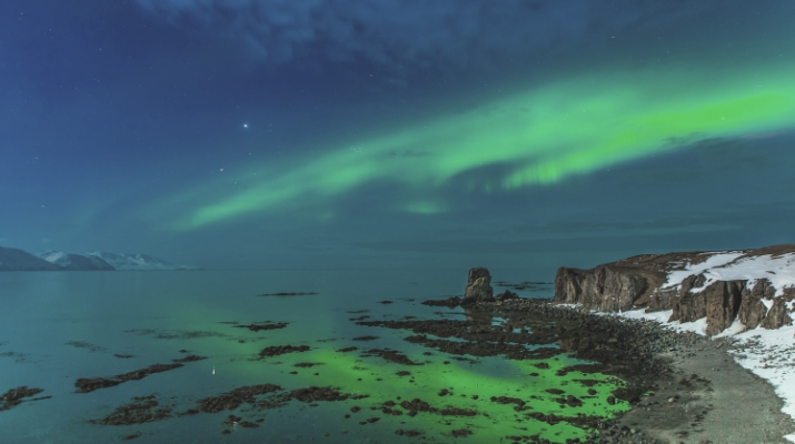 Featured Image Aurora Borealis above Bakkahöfði two kilometers north of Húsavík © Gaukur Hjartarson