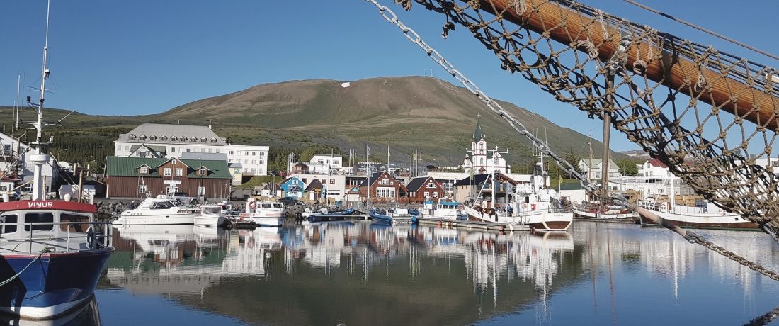 Slider Húsavík harbour in summer time © Húsavíkurstofa